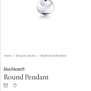 TiffanyandCo.Elsa Peretti 55mm Sterling silver round pendant on black silk cord.
